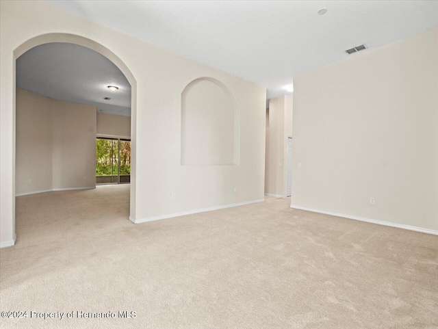 4264 Braemere Dr, Brooksville, FL 34609 - spare room with light carpet