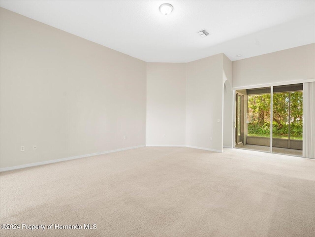 4264 Braemere Dr, Brooksville, FL 34609 - unfurnished room featuring light colored carpet