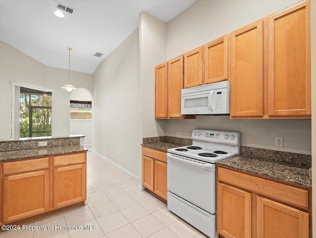 4264 Braemere Dr, Brooksville, FL 34609 - kitchen with pendant lighting, dark stone counters, white appliances, and light tile patterned floors