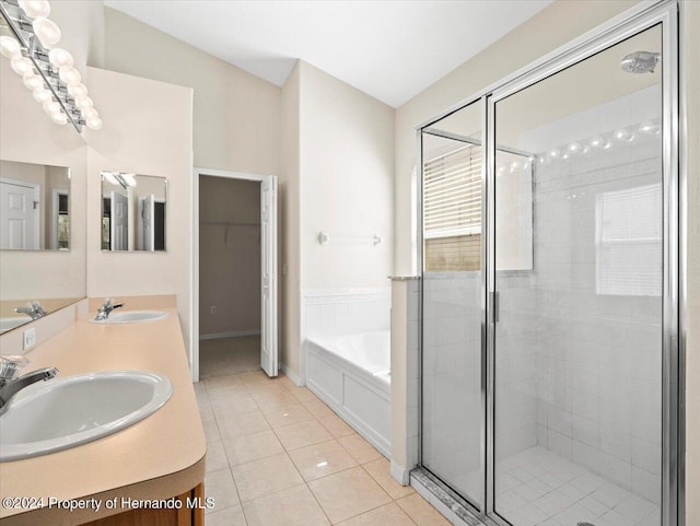 4264 Braemere Dr, Brooksville, FL 34609 - bathroom featuring vanity, tile patterned flooring, and separate shower and tub