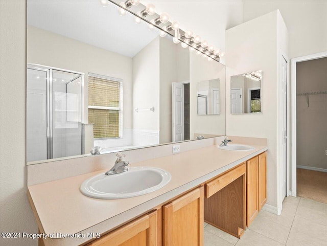 4264 Braemere Dr, Brooksville, FL 34609 - bathroom with vanity, walk in shower, and tile patterned floors