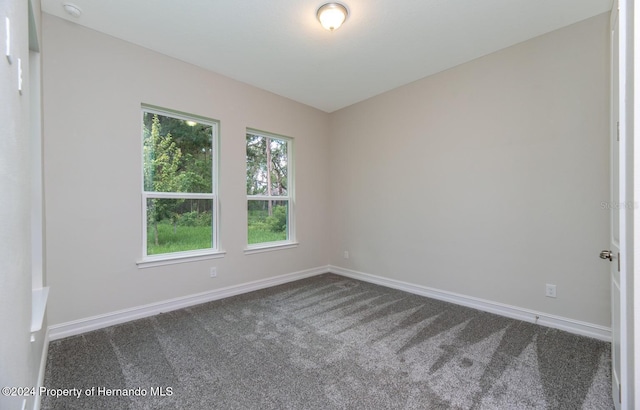 empty room with carpet floors