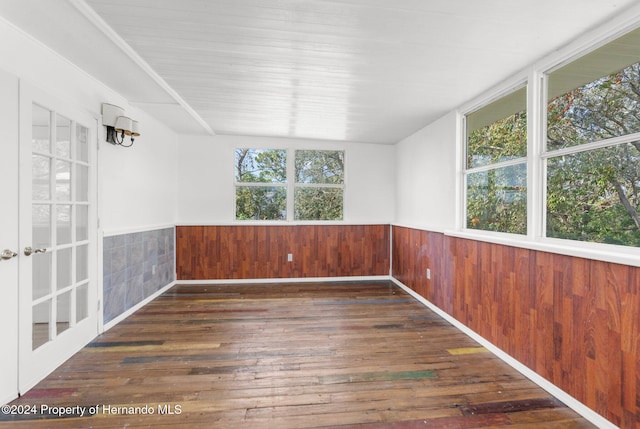 unfurnished sunroom featuring plenty of natural light