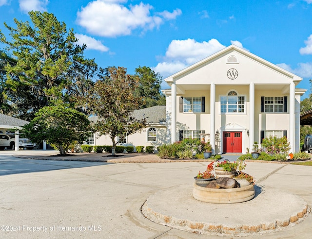 view of greek revival inspired property