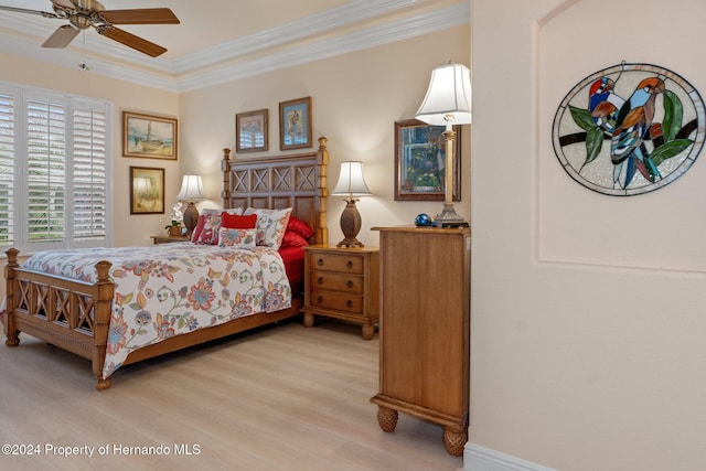 9312 Gentle Ben Ct, Weeki Wachee, FL 34613 - bedroom with light wood-type flooring, ornamental molding, and ceiling fan