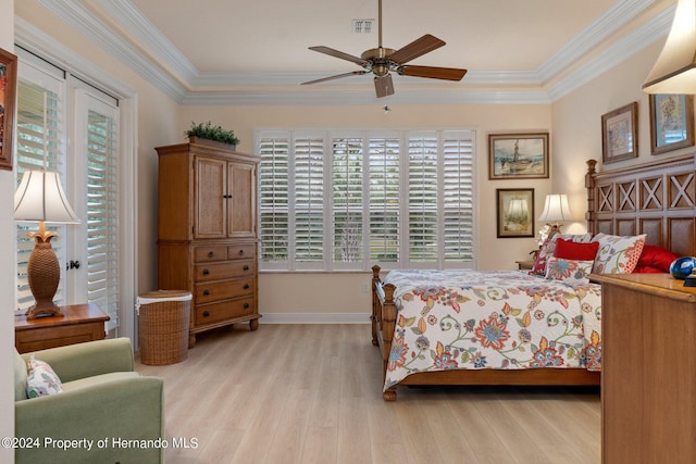 9312 Gentle Ben Ct, Weeki Wachee, FL 34613 - bedroom with light wood finished floors, ornamental molding, and a ceiling fan