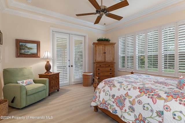 bedroom with access to exterior, light hardwood / wood-style floors, ceiling fan, and crown molding