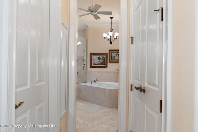 9312 Gentle Ben Ct, Weeki Wachee, FL 34613 - bathroom with crown molding, a ceiling fan, a garden tub, a tile shower, and tile patterned floors