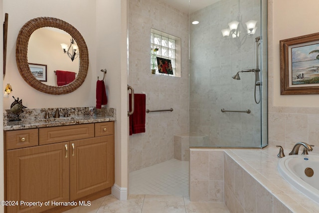 9312 Gentle Ben Ct, Weeki Wachee, FL 34613 - bathroom featuring a bath, vanity, a walk in shower, and tile patterned flooring