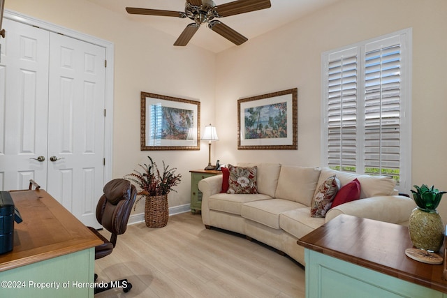 office area with ceiling fan and light hardwood / wood-style floors