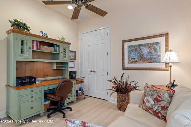 office area with ceiling fan and light hardwood / wood-style flooring