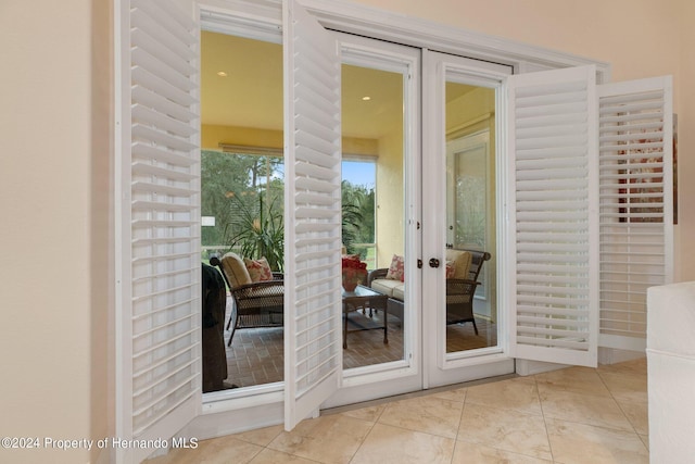 9312 Gentle Ben Ct, Weeki Wachee, FL 34613 - doorway to outside featuring french doors