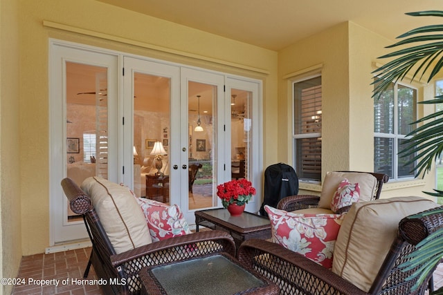 9312 Gentle Ben Ct, Weeki Wachee, FL 34613 - view of patio with french doors