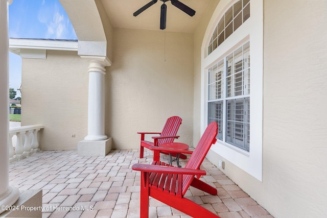 view of patio featuring ceiling fan