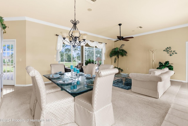 dining room with a wealth of natural light, ornamental molding, and ceiling fan with notable chandelier