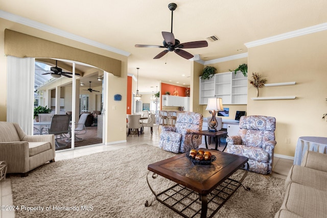 living room with light tile patterned flooring and ornamental molding