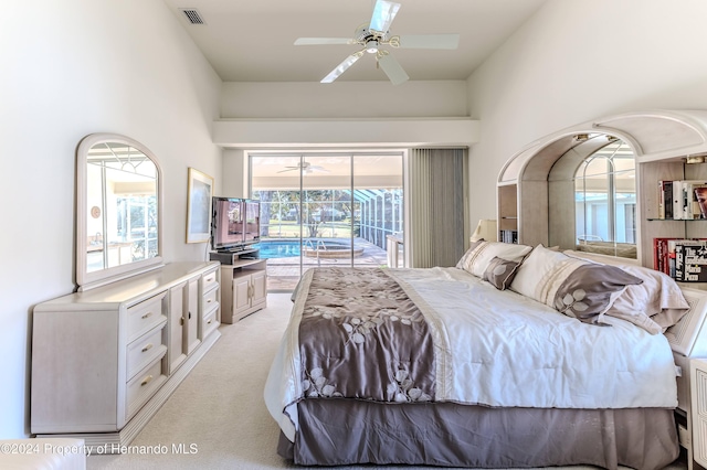 bedroom featuring access to exterior, ceiling fan, and light colored carpet