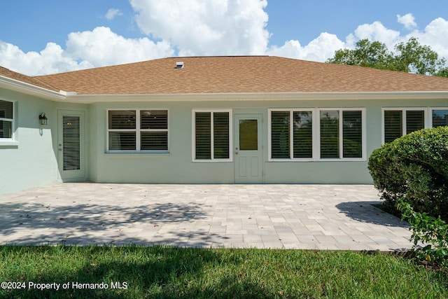 rear view of property with a patio