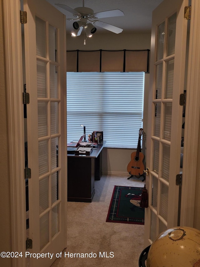 kitchen featuring carpet flooring, french doors, and ceiling fan