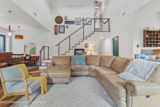 living room with a high ceiling