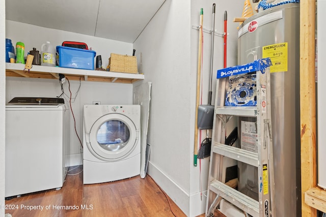 laundry area featuring hardwood / wood-style floors and washer and clothes dryer