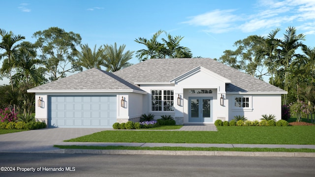 view of front of house featuring a garage, a front lawn, and french doors