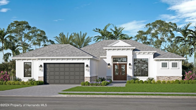 view of front of home with french doors, a front lawn, and a garage