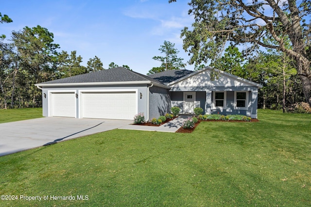 view of front facade featuring a garage and a front yard