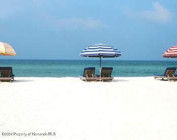 property view of water with a beach view