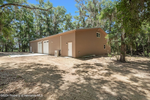 exterior space with a garage