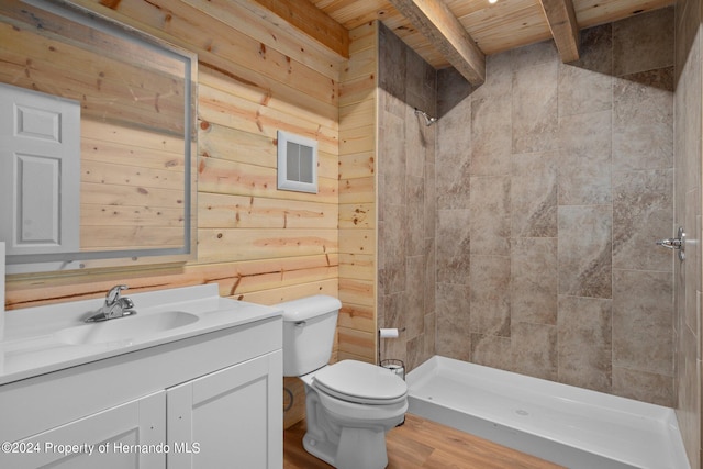 bathroom featuring wood walls, beamed ceiling, wood ceiling, and hardwood / wood-style floors