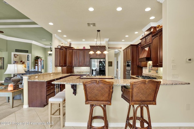 kitchen featuring stainless steel appliances, kitchen peninsula, a kitchen breakfast bar, crown molding, and premium range hood