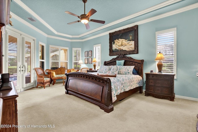 carpeted bedroom featuring ornamental molding, access to outside, multiple windows, and ceiling fan