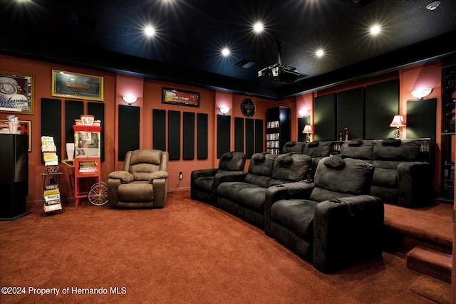 cinema room featuring carpet