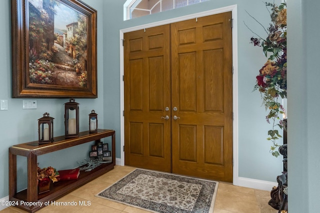 view of tiled foyer entrance