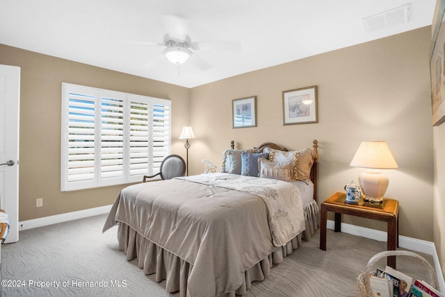 carpeted bedroom featuring ceiling fan