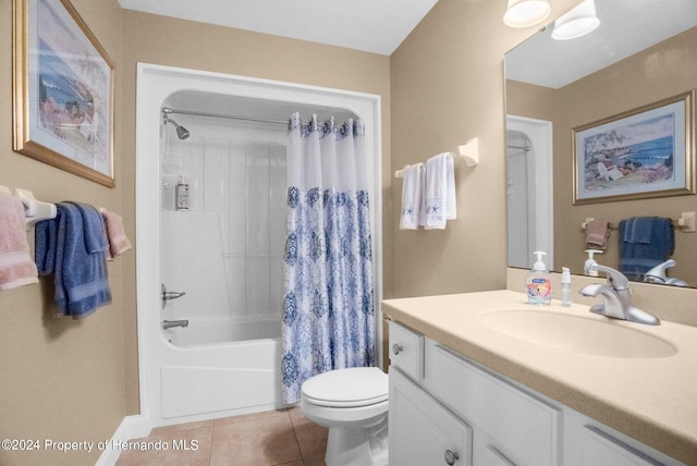 full bathroom with toilet, vanity, tile patterned floors, and shower / bathtub combination with curtain