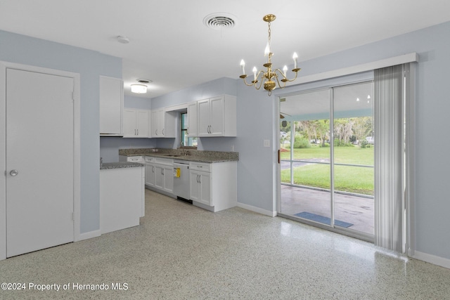 kitchen featuring white cabinets, hanging light fixtures, a chandelier, and white dishwasher