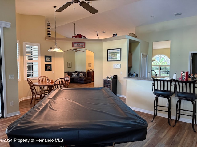 rec room with hardwood / wood-style flooring, ceiling fan, pool table, and high vaulted ceiling