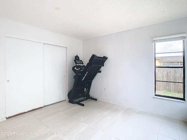 workout area with a wealth of natural light