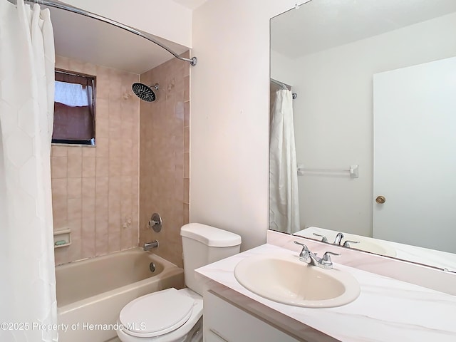 full bathroom with vanity, toilet, and shower / bath combo with shower curtain