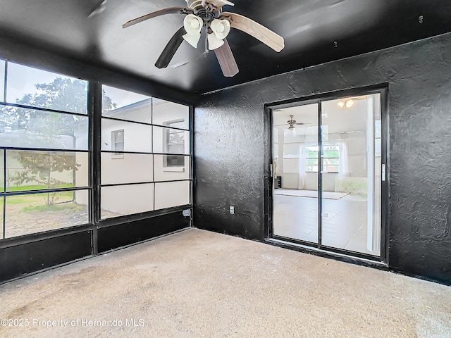 unfurnished room featuring ceiling fan