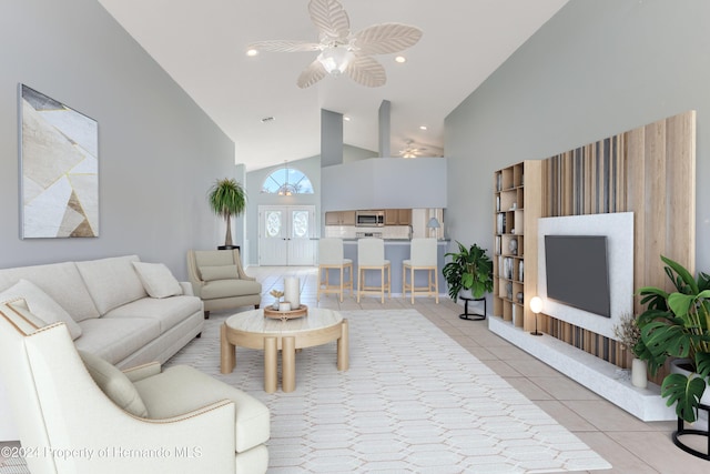 tiled living room with ceiling fan and high vaulted ceiling