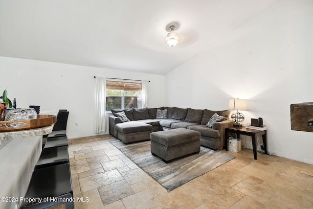 living room with vaulted ceiling