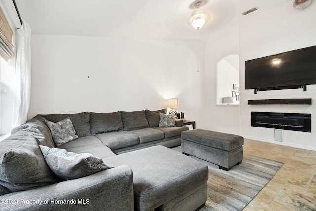 living room featuring ceiling fan