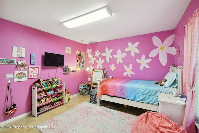 bedroom with a textured ceiling