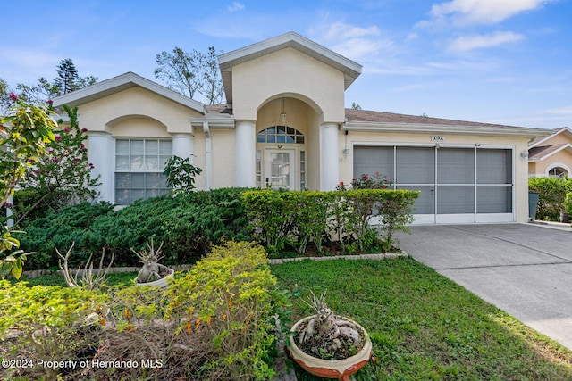 single story home featuring a garage