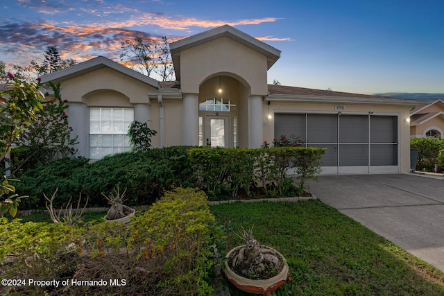 single story home with a garage