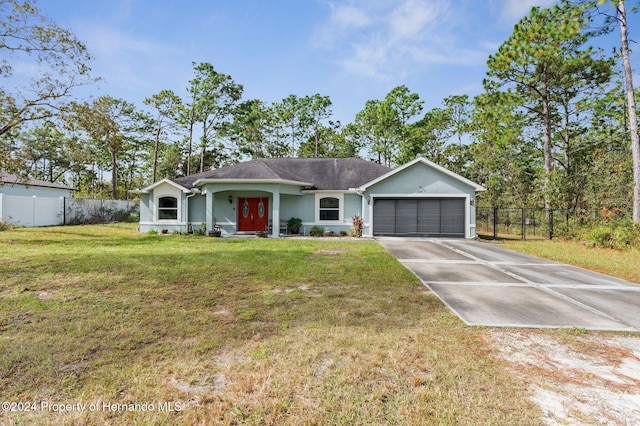 single story home with a garage and a front yard