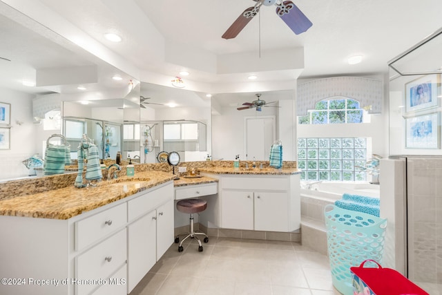 bathroom featuring tile patterned flooring, vanity, and independent shower and bath